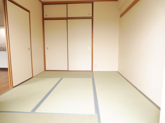 プランドール千里丘の居間写真