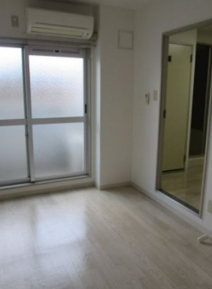 居室・リビング　別部屋の写真を使用しております。