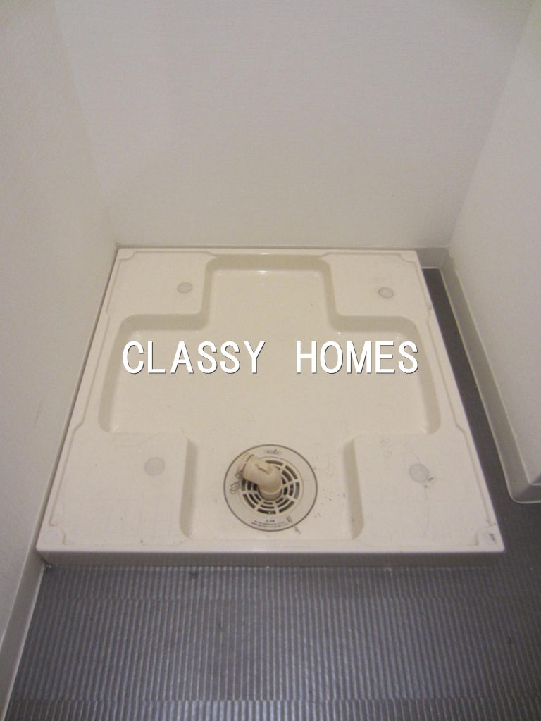 その他設備　2014年竣工アクサス汐留：洗濯機置場