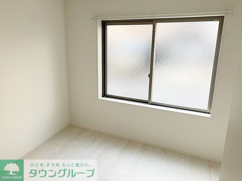 レピュア三ノ輪レジデンスIIの居間写真