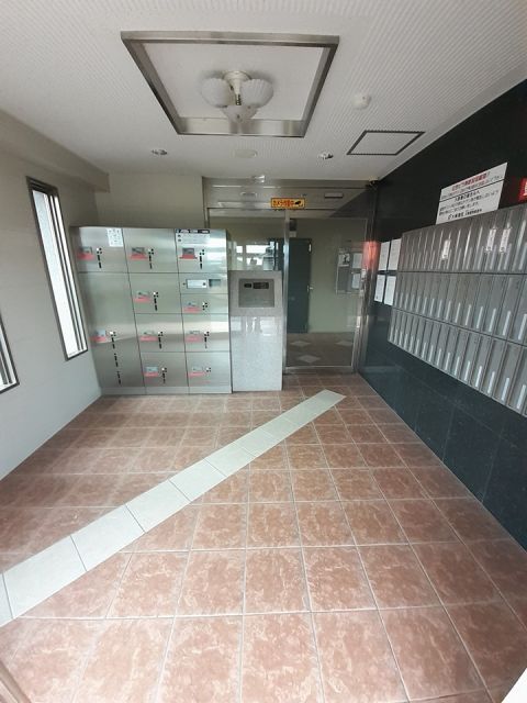 【熊本市北区四方寄町のマンションのエントランス】