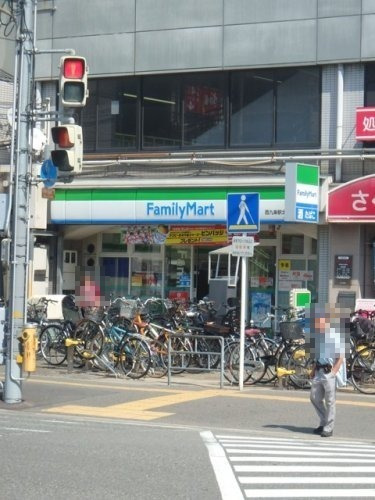 コンビニ　ファミリーマート 西九条駅北店（コンビニ）まで438m