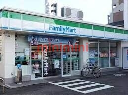コンビニ　ファミリーマート千里丘北口店（コンビニ）まで101m