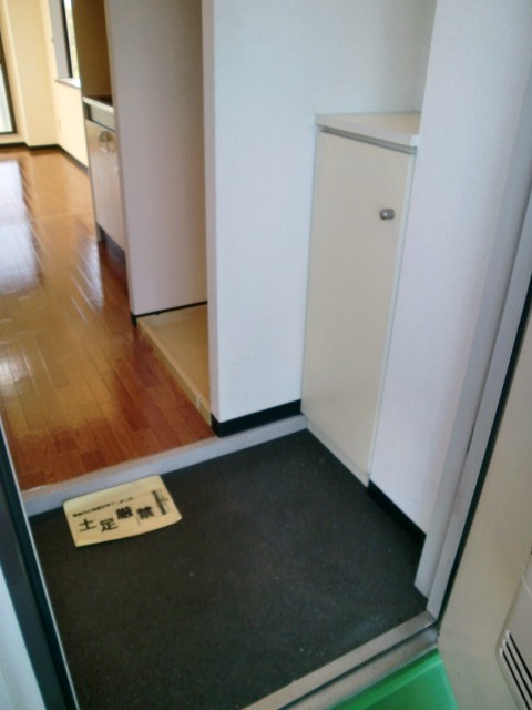丸幸マンションの玄関写真