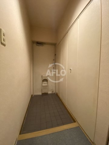 玄関　日宝ライフ十二軒町　玄関
