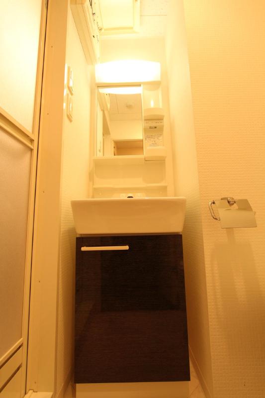 洗面設備　同タイプの別部屋写真です。現況優先となります。