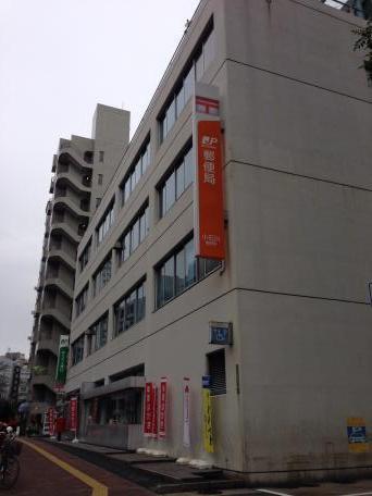 郵便局　小石川郵便局（郵便局）まで719m