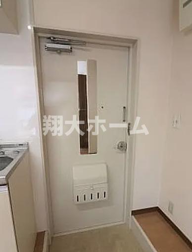 東京メトロ南北線 後楽園駅 徒歩10分 3階建 築48年の玄関写真