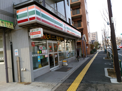 コンビニ　セブンイレブン 千住桜木店（コンビニ）まで703m
