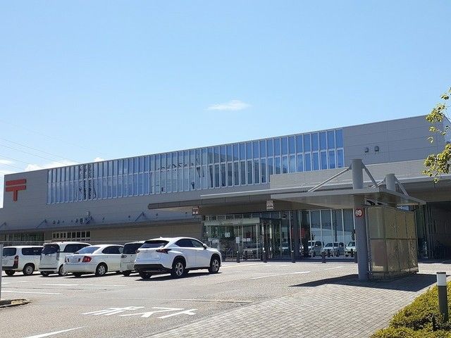郵便局　新金沢郵便局（郵便局）まで935m