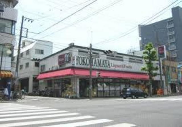 スーパー　★★酒屋（スーパー）まで1100m