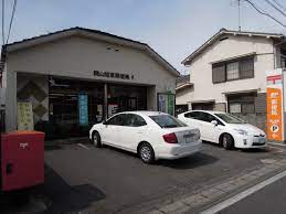 郵便局　岡山旭東郵便局（郵便局）まで828m