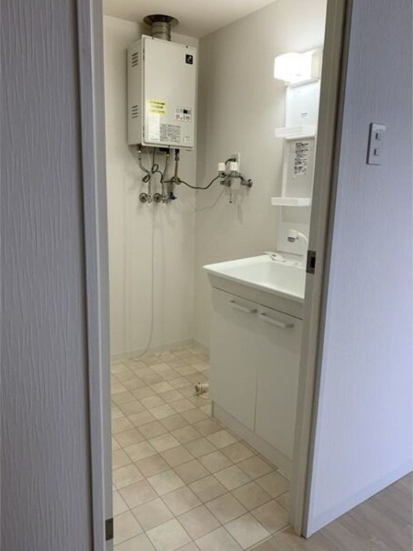 洗面設備　４０２号室の部屋写真となります。