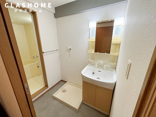 洗面設備　同物件の別部屋になります。