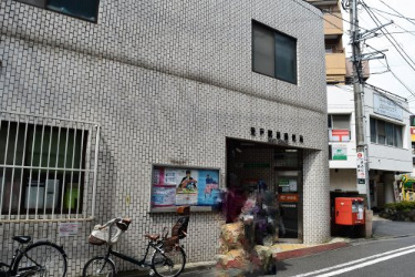 郵便局　登戸駅前郵便局（郵便局）まで296m