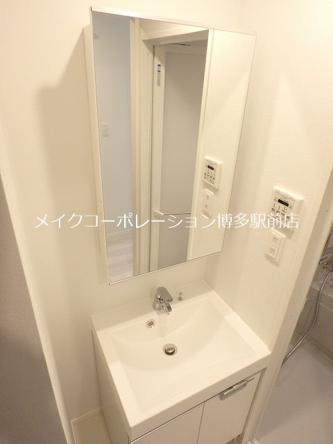 洗面設備　※入居中の為別部屋写真使用現状優先