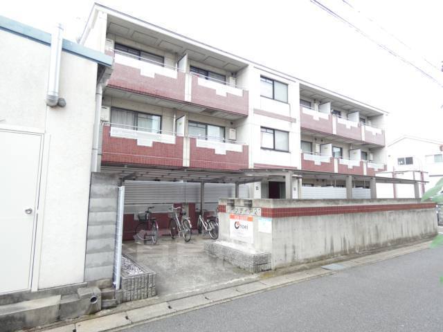 京都市伏見区向島庚申町のマンションの建物外観