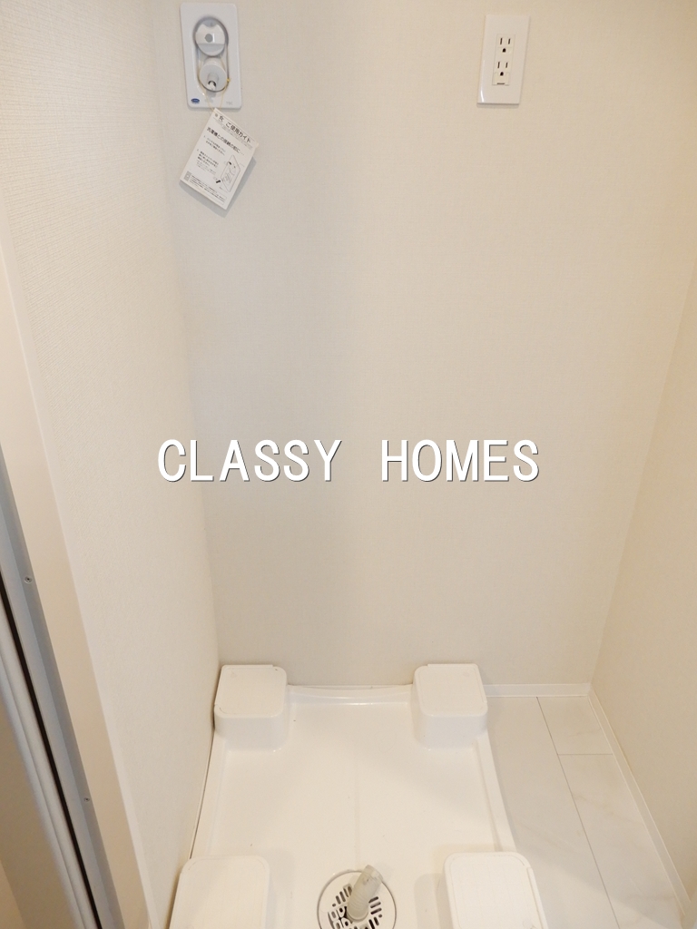 その他設備　2020年竣工　メゾンドアーク南大井：洗濯機置き場