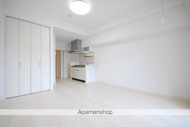 ネオアクシス西千石町の居間写真