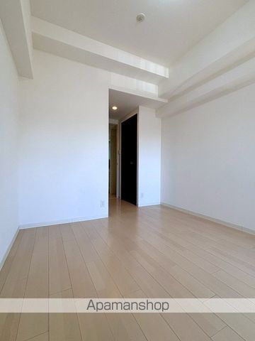 地下鉄御堂筋線 大国町駅 徒歩3分 9階建 築13年の居間写真