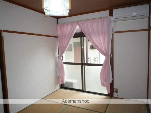 コーポ千寿Iの居間写真