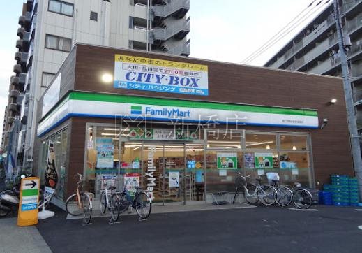 コンビニ　ファミリーマート 野口西糀谷産業道路店（コンビニ）まで243m