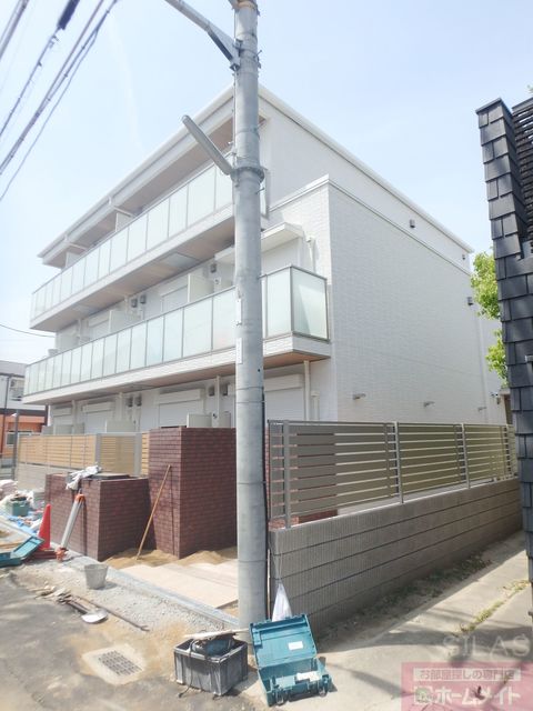 【東大阪市菱屋西のマンションの建物外観】