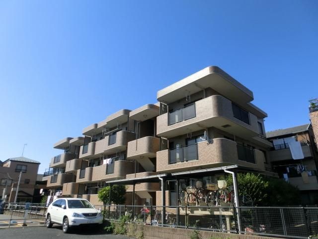 建物外観　敷地内駐車場もございます。都市ガス対応のマンションです。