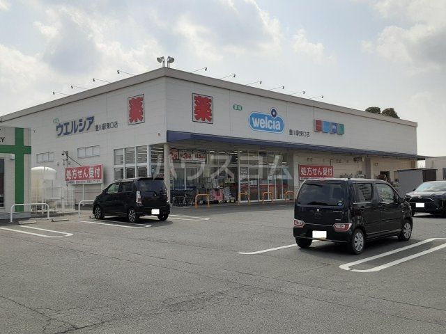ドラックストア　ウエルシア豊川駅東口店（ドラッグストア）まで482m