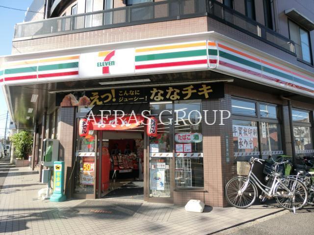 コンビニ　セブンイレブン足立島根店（コンビニ）まで140m