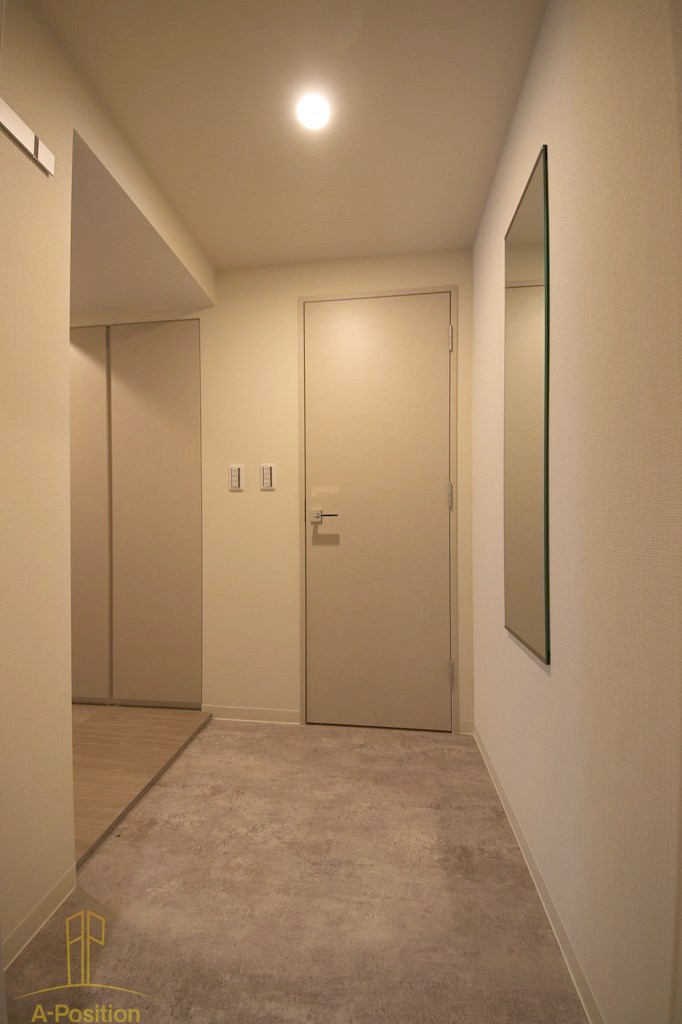 玄関　コンフォリア・リヴ北久宝寺Q