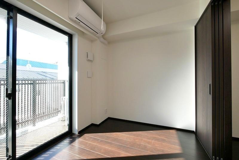 ラフィスタ方南町の居間写真