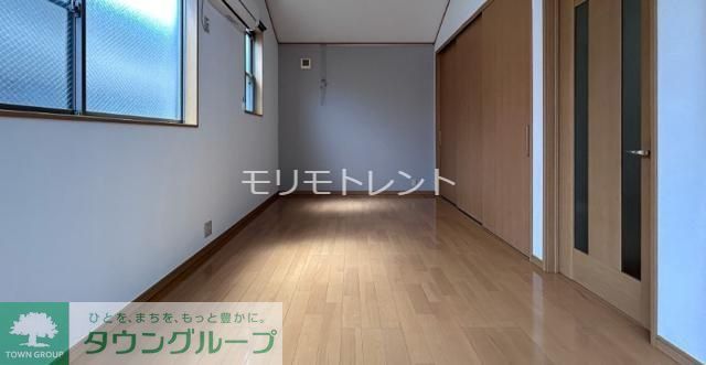 オーチャードコート丸子通2丁目IIの居間写真