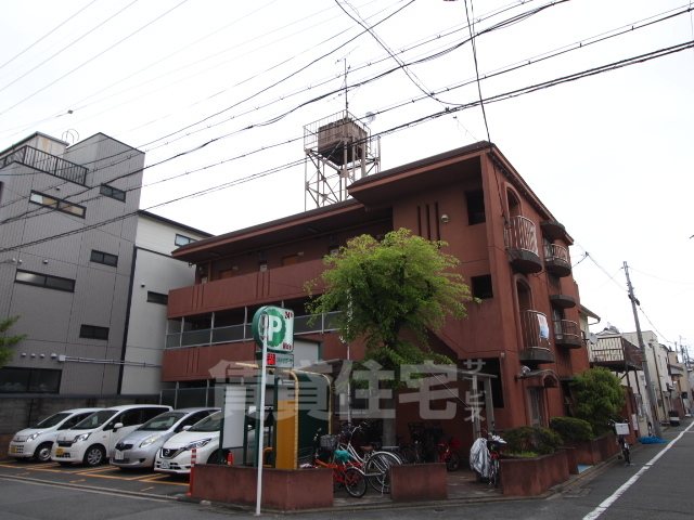 京都市南区西九条南田町のマンションの建物外観