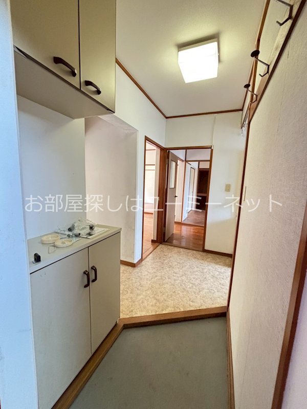 南九州市 4階建 築33年の玄関写真