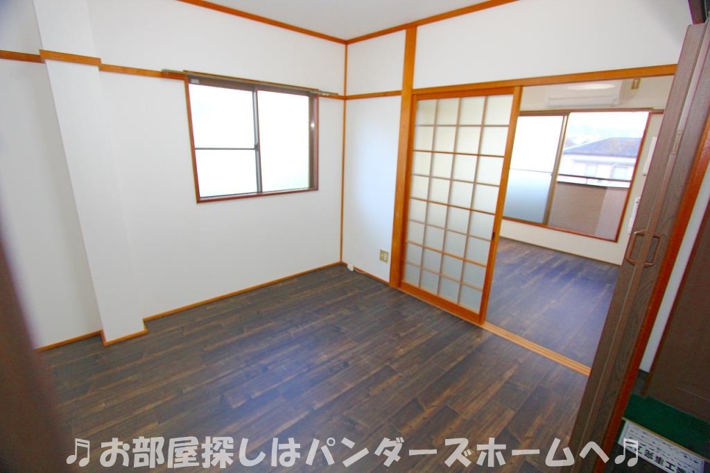 須山ハピネスの居間写真