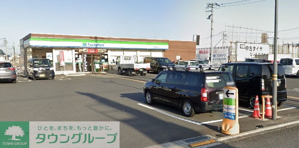 コンビニ　ファミリーマート越谷南荻島北店（コンビニ）まで310m