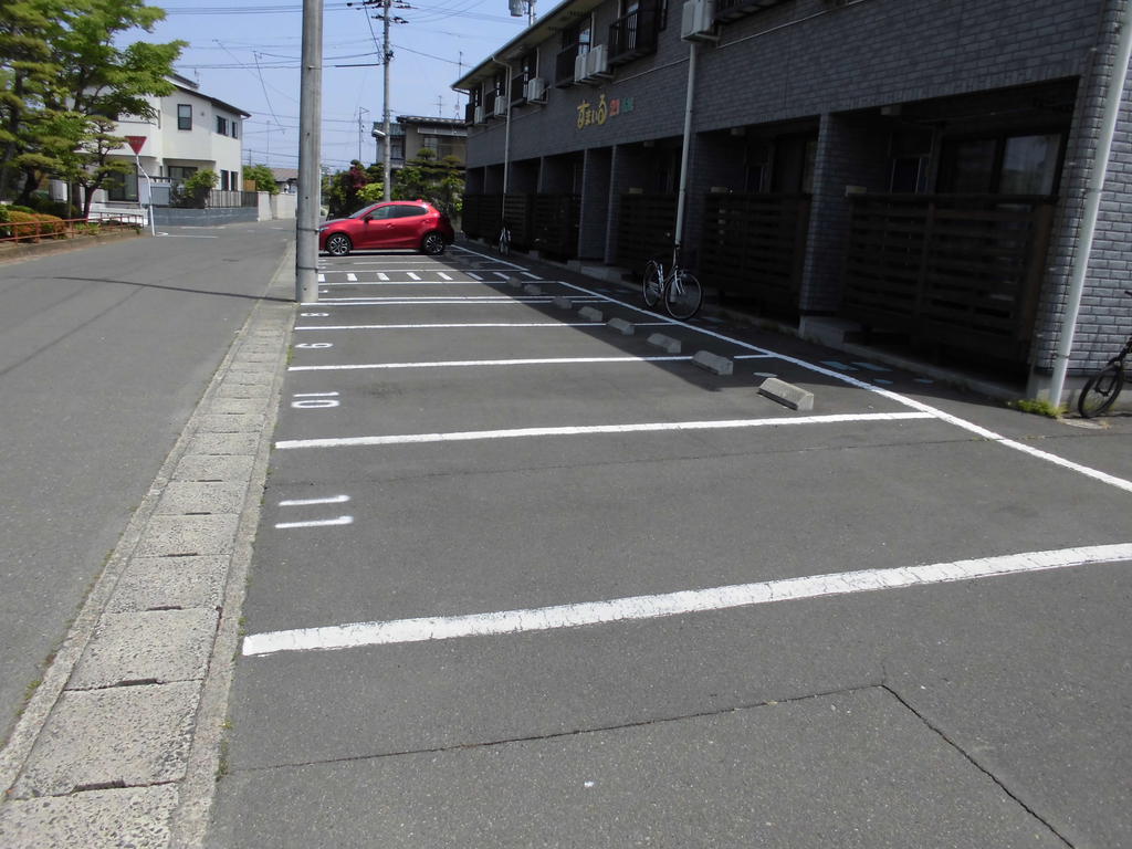 【すまいる21番館の駐車場】