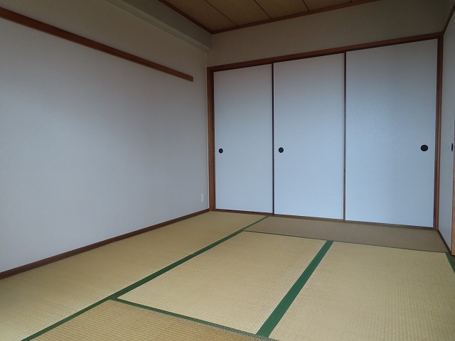 パブリコーポ鈴が台Sの居間写真