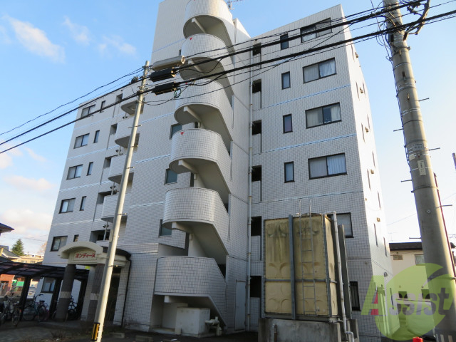 【仙台市宮城野区萩野町のマンションの建物外観】