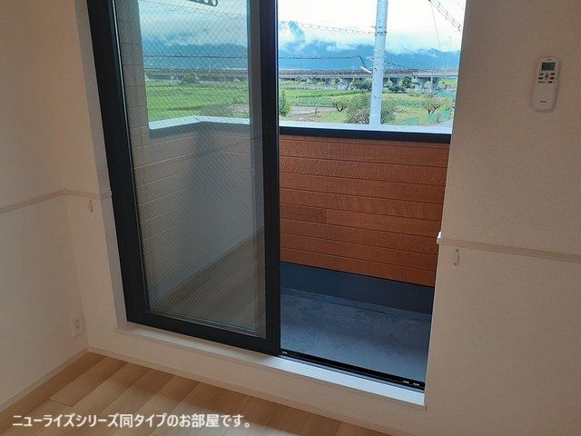 【亘理郡亘理町逢隈田沢のアパートのバルコニー】