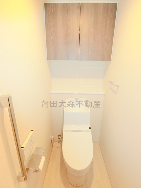 トイレ　温水洗浄便座.戸棚付き