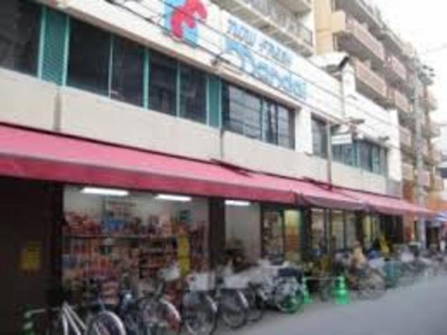 スーパー　万代塚本店（スーパー）まで724m