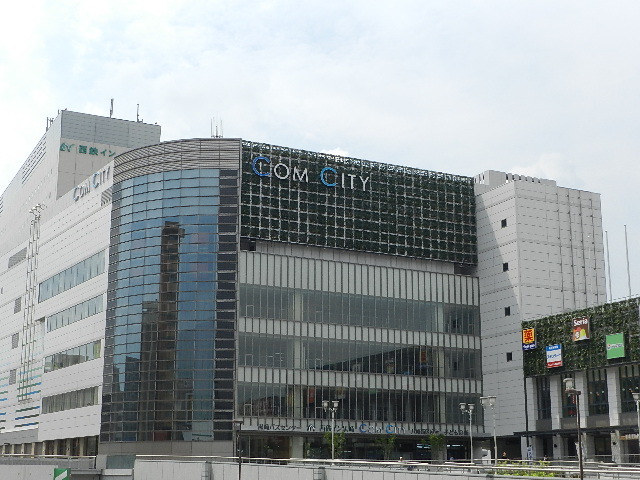 ショッピングセンター　コムシティ（ショッピングセンター）まで486m