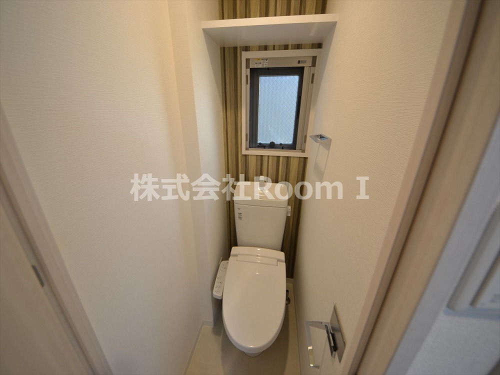 トイレ　落ち着いた色調のトイレです