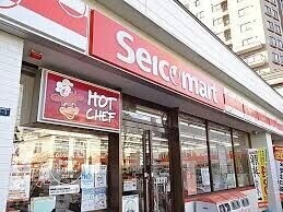 コンビニ　セイコーマートあきもと店（コンビニ）まで91m