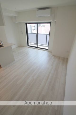 レジュールアッシュ谷町四丁目グランクラスの居間写真