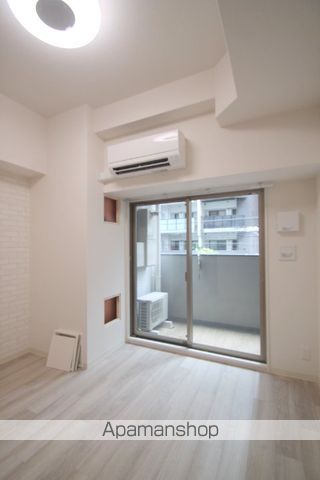 プレサンス天満橋ヴェルエラの居間写真