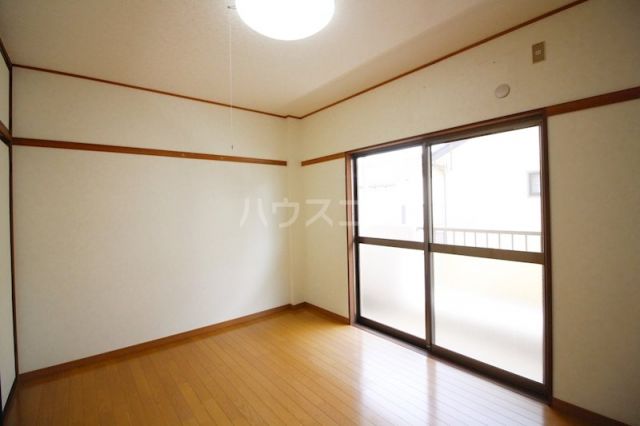 ペアシティ榊 Aの居間写真