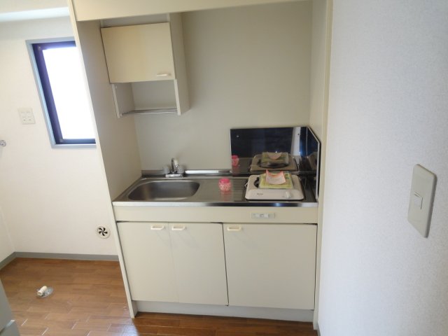 キッチン　写真は別号室のものです。